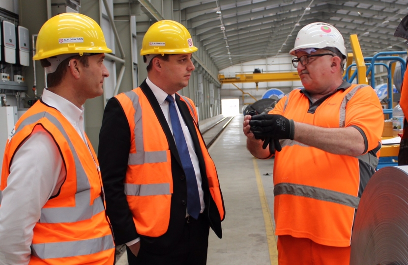 Ben Houchen with workers at AV Dawson