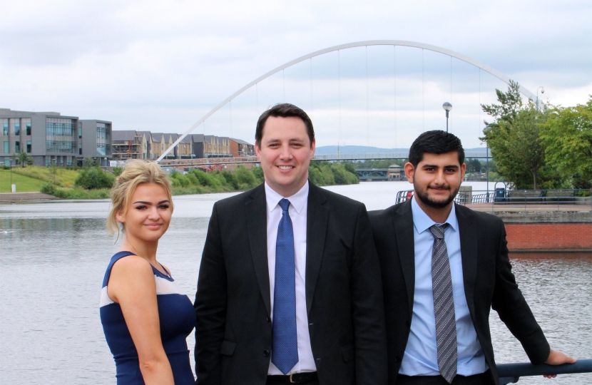 ees Valley Mayor Ben Houchen with newly promoted employees Ameer Khan and Niamh Cooney