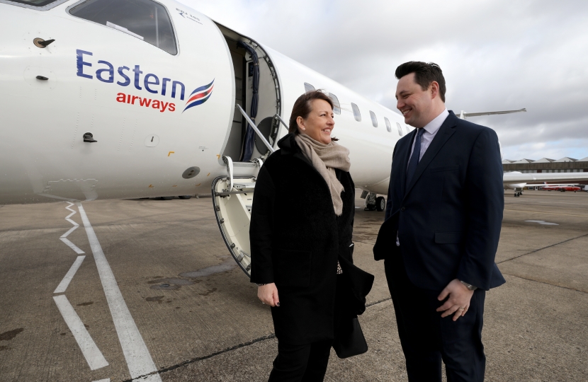 Tees Valley Mayor Ben Houchen greeting the first passenger