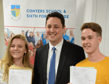 Tees Valley Mayor Ben Houchen congratulates twins Anna and Matthew Covell on their A level success