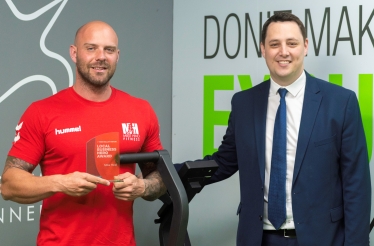 Tees Valley Mayor Ben Houchen presenting Mike Hind with a Tees Valley Business Hero Award