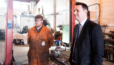 Tees Valley Mayor Ben Houchen, right, with apprentice Jack Laverick at North Bay Railway Engineering Services  