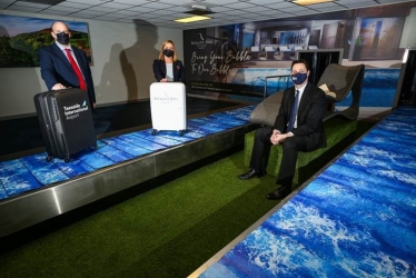 From left, Rockliffe Hall Managing Director Jason Adams, Rockliffe Hall Commercial Director Teresa Kingston and Tees Valley Mayor Ben Houchen launching the partnership at Teesside Airport’s arrivals hall